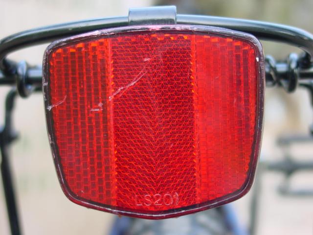 A bicycle light reflector